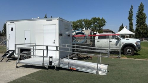 Lavatory unit a trailer staged before guests arrive outside Fresno