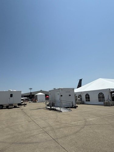 Lavatory unit a trailer staged before guests arrive outside Oakland
