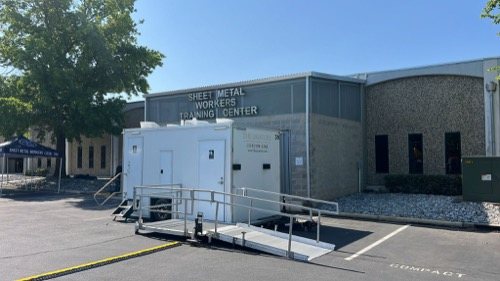 ADA trailer set up on a greater Sacramento Valley site, wider view