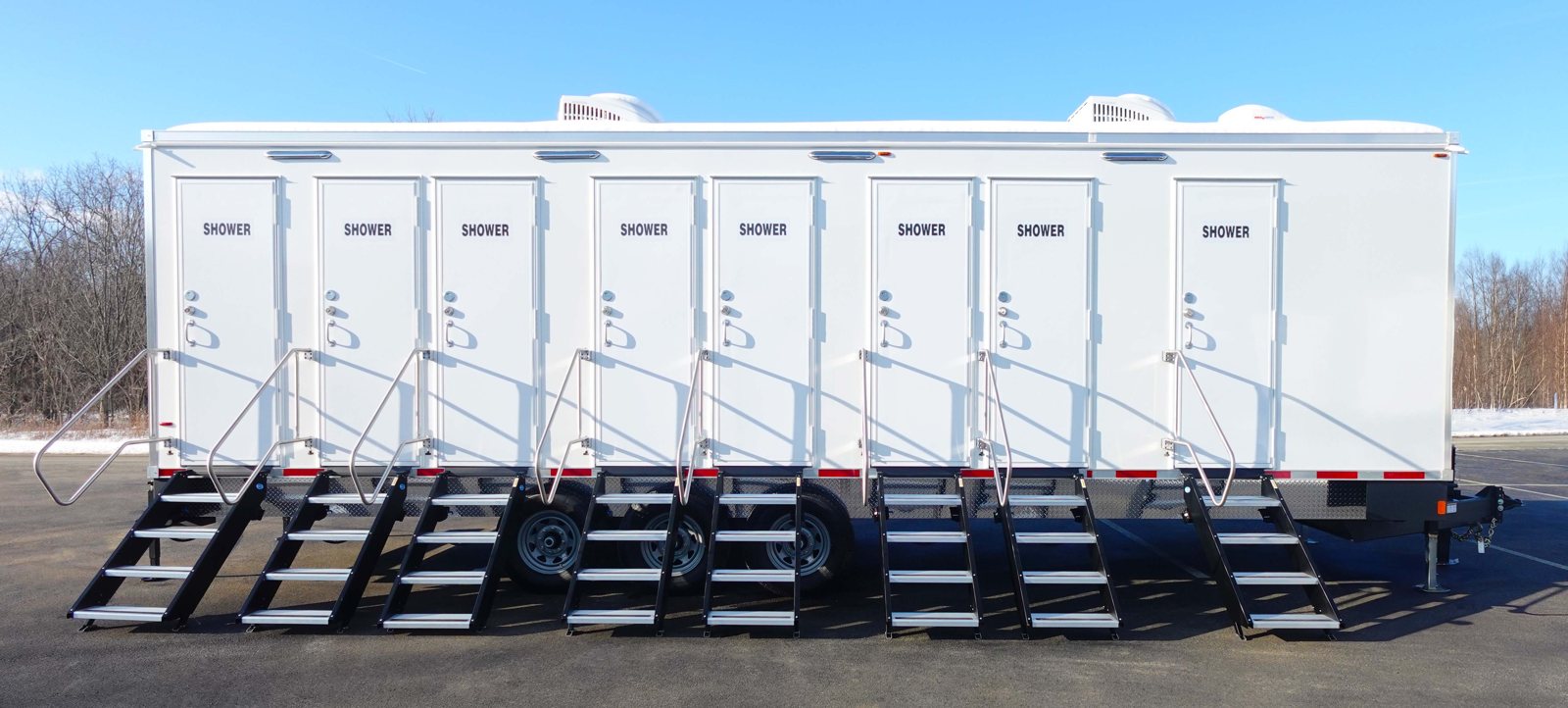 The 8-Station Private Shower Trailer, our highest-capacity unit, available for rent in Boise