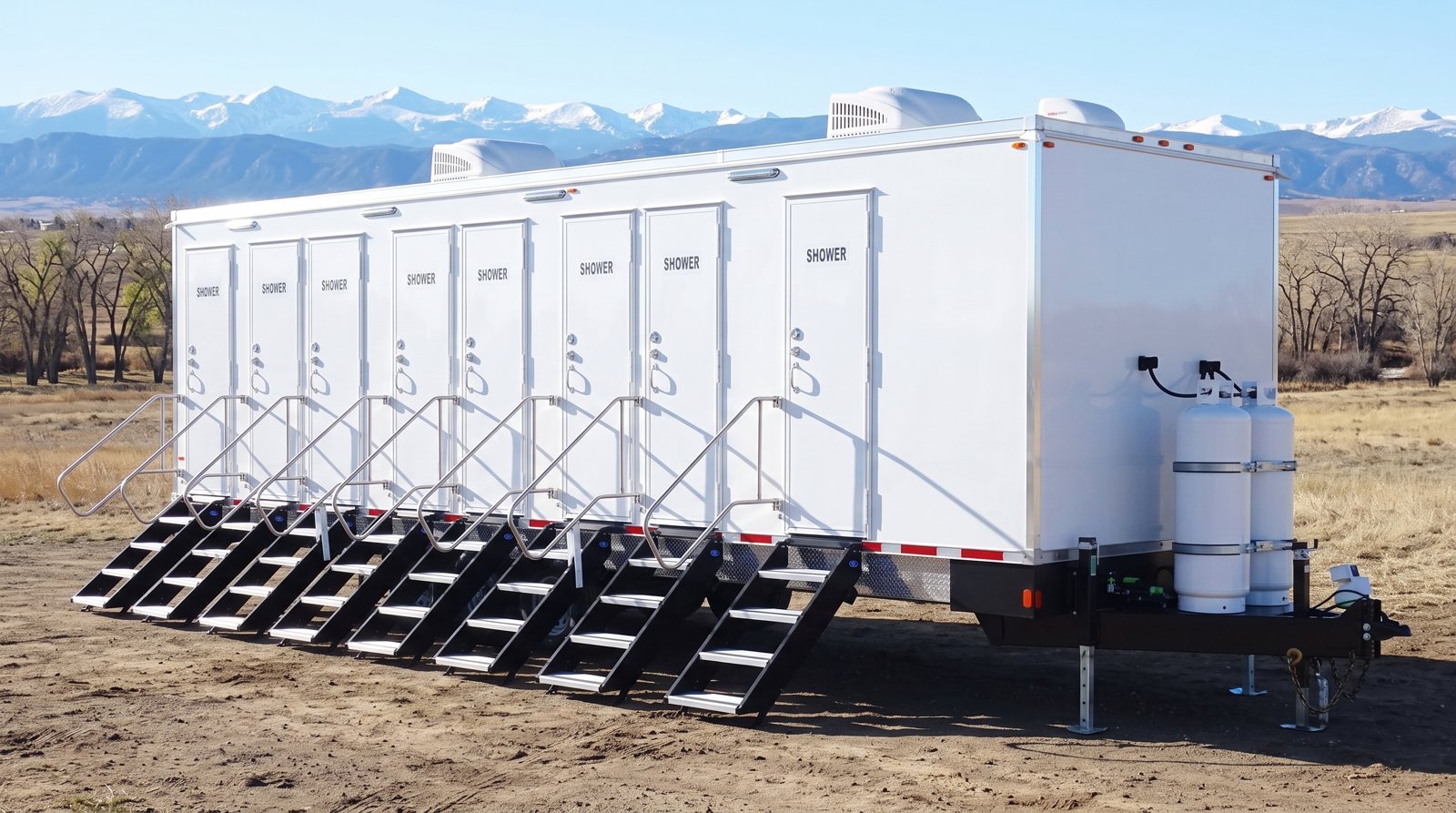 Private 8-station shower trailer rental parked in Denver, CO