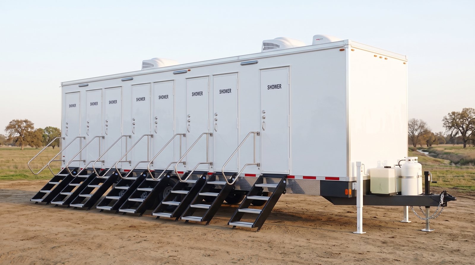 Private 8-station shower trailer rental parked in Elk Grove, CA