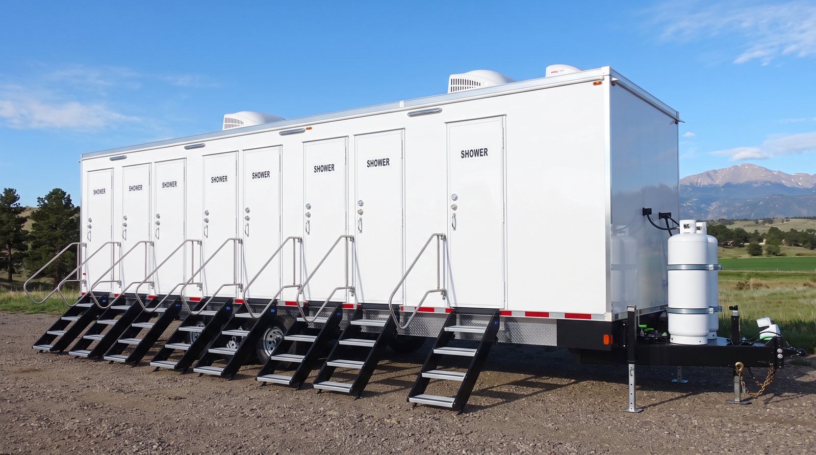 Private 8-station shower trailer rental parked in Fort Collins, CO