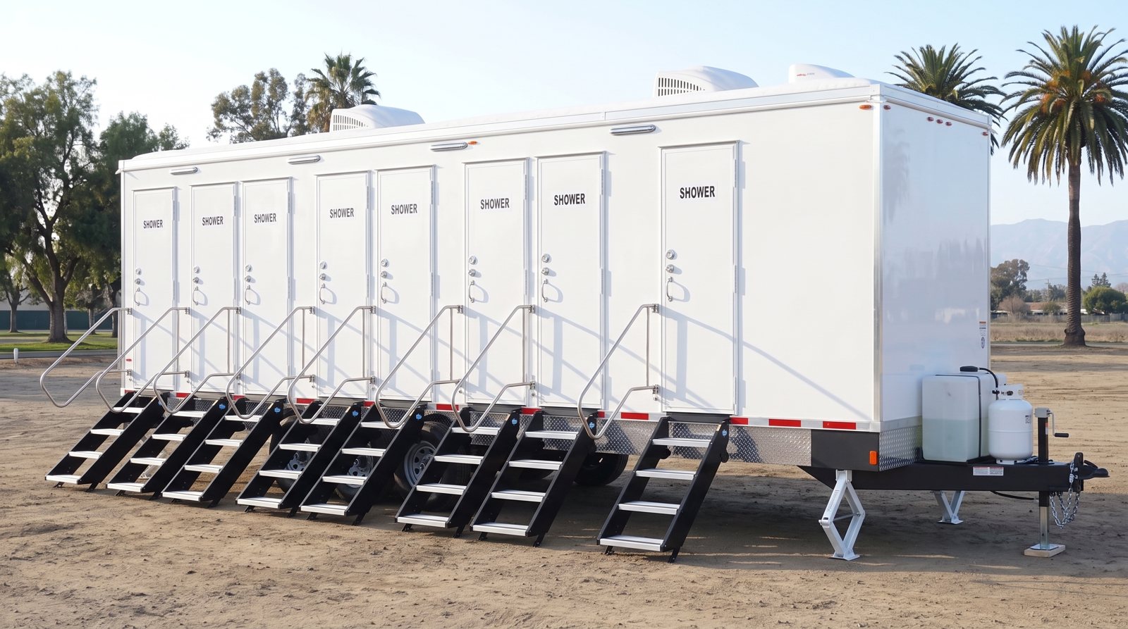 Private 8-station shower trailer rental parked in Garden Grove, CA