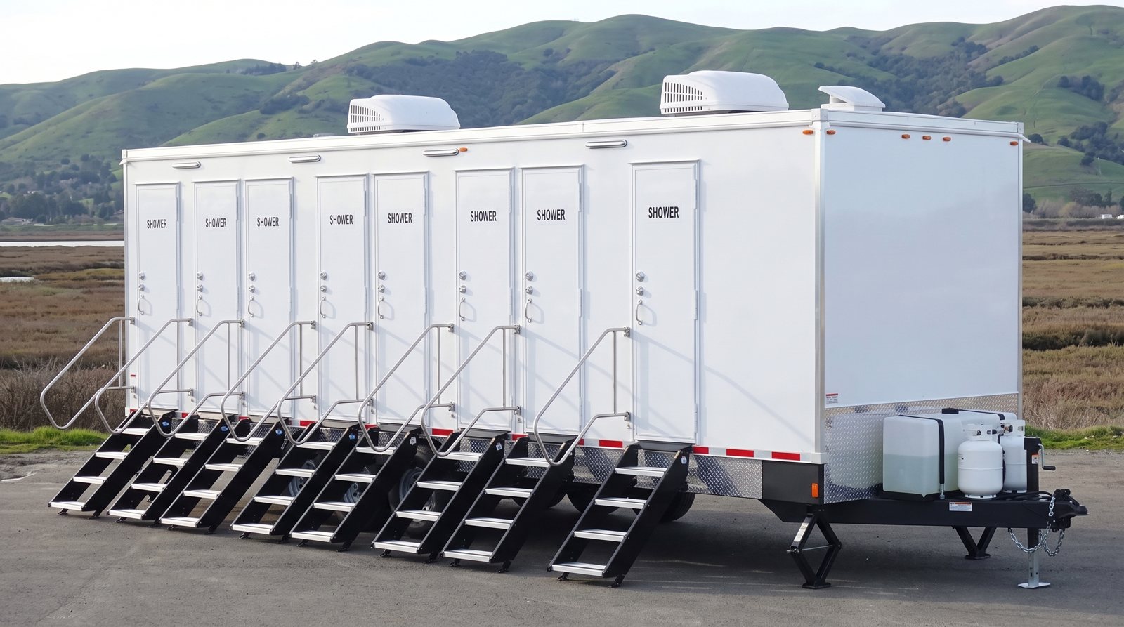 Private 8-station shower trailer rental parked in Hayward, CA