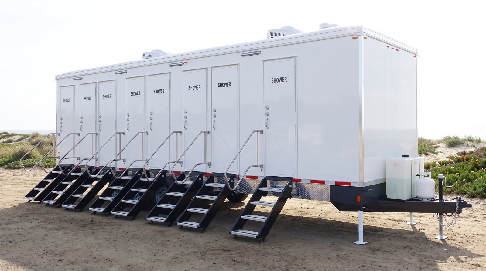 Private 8-station shower trailer rental parked in Huntington Beach, CA