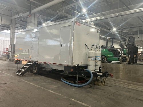 Laundry trailer a trailer set before the first shift near Glendale