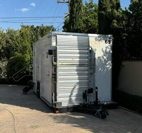 Lavatory crew setting a laundry trailer near Burbank