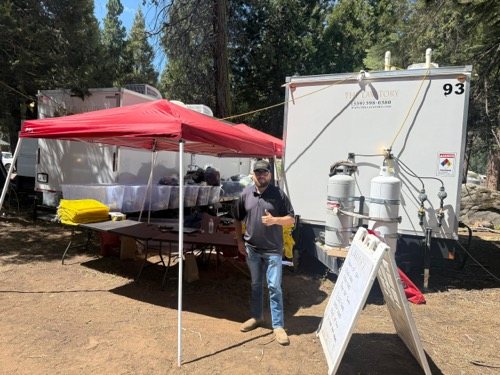 Laundry trailer staged outside Denver, wider view