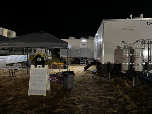 8 station laundry trailer in the parking lot, a Salt Lake City laundry trailer rental job