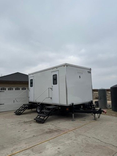 Restroom trailer staged outside Sparks