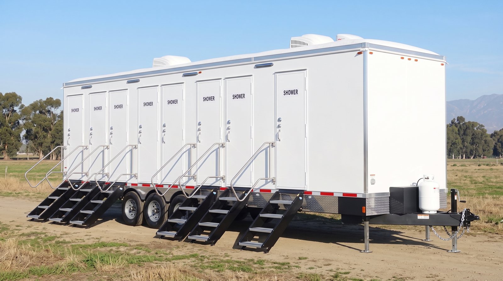 Private 8-station shower trailer rental parked in Ontario, CA