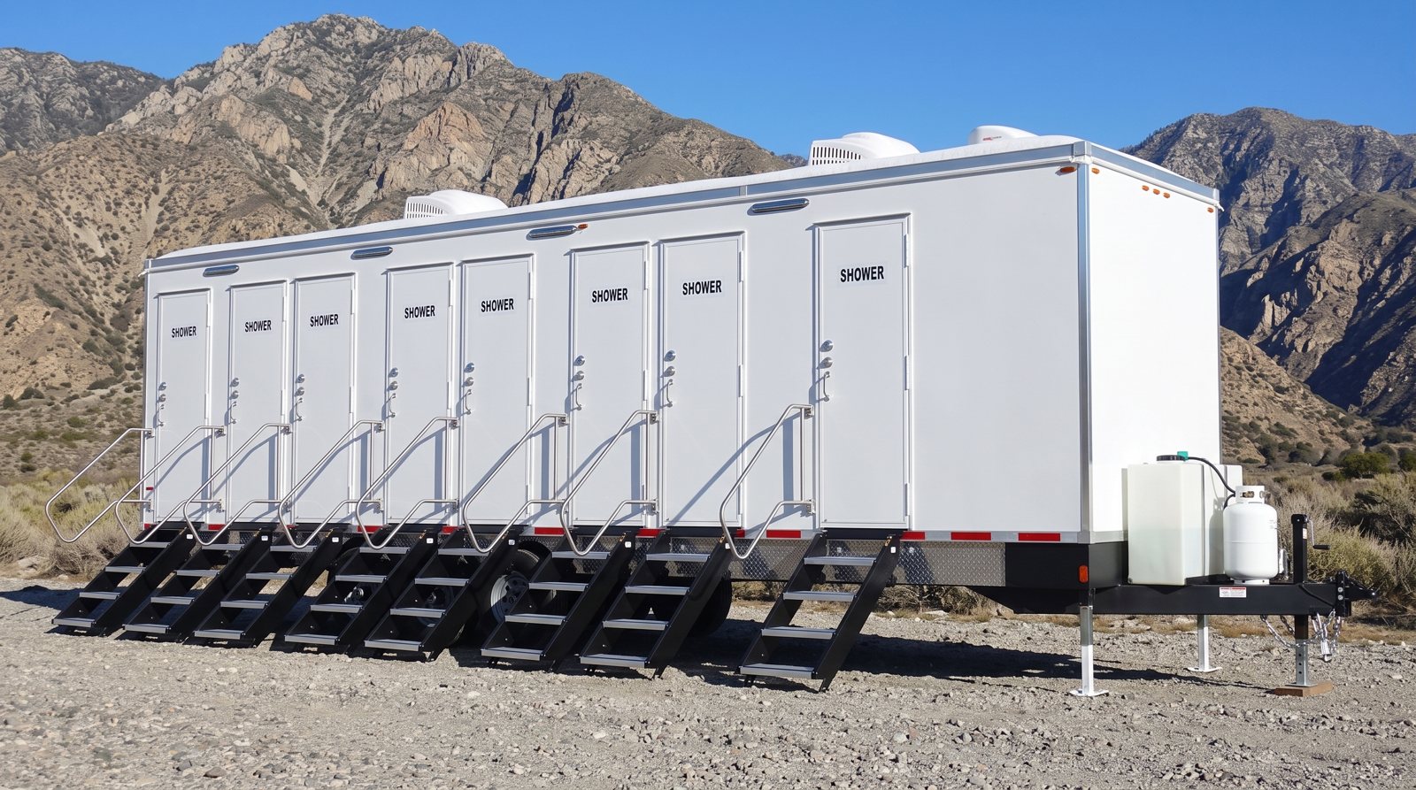 Private 8-station shower trailer rental parked in Rancho Cucamonga, CA