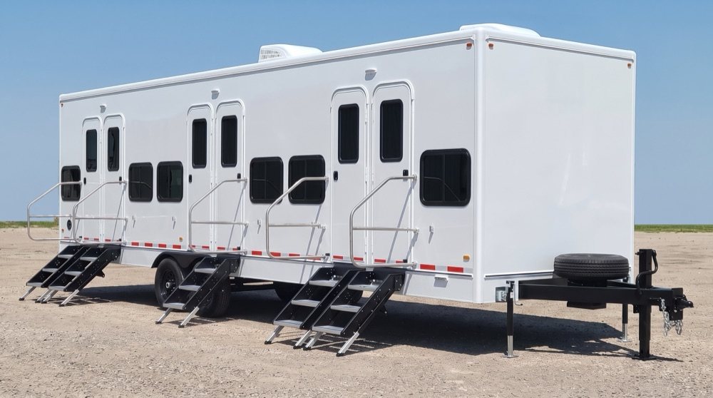 sleeper bunkhouse trailer set up on a job in Colorado